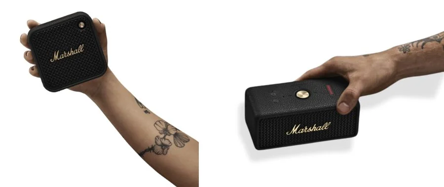 Side-by-side images of person with arm tattoos holding the Marshall Willen II and Emberton III speakers.