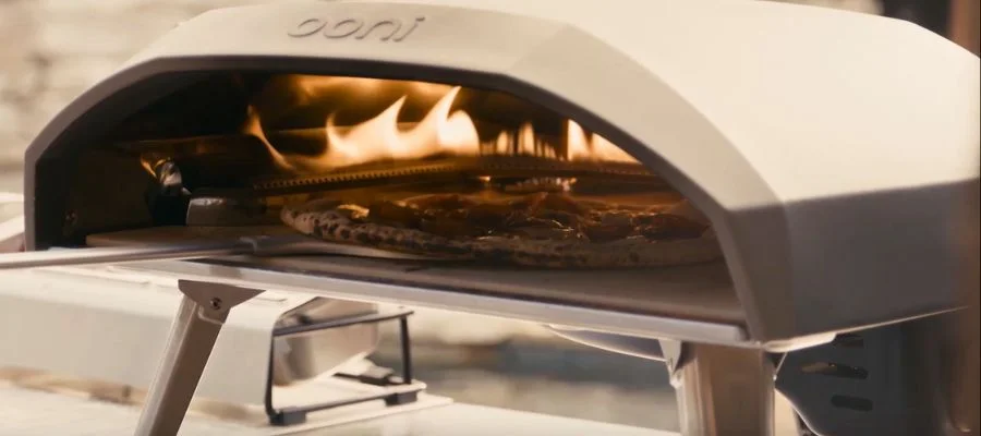 A pizza cooking in the Ooni Koda 16.