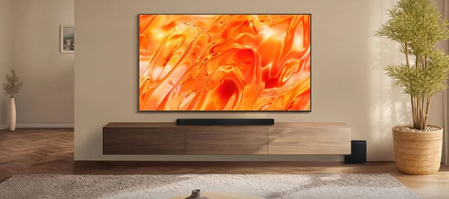 The Samsung QN70H installed in a modern living room.
