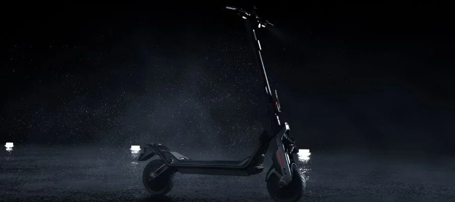 A Segway scooter in the dark against a black background in the rain.