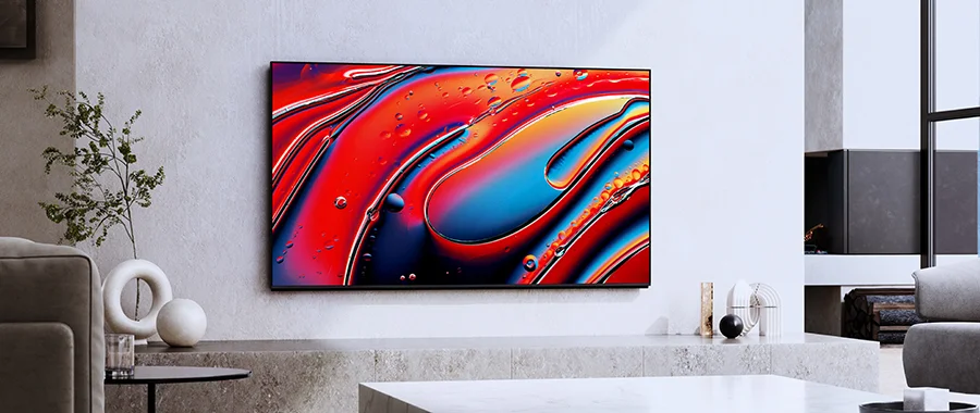 The Sony Bravia 9 mounted on the wall in a white room displaying a colorful abstract image