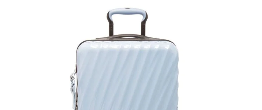A front-facing image of the halogen blue TUMI 19 Degree Carry-On luggage