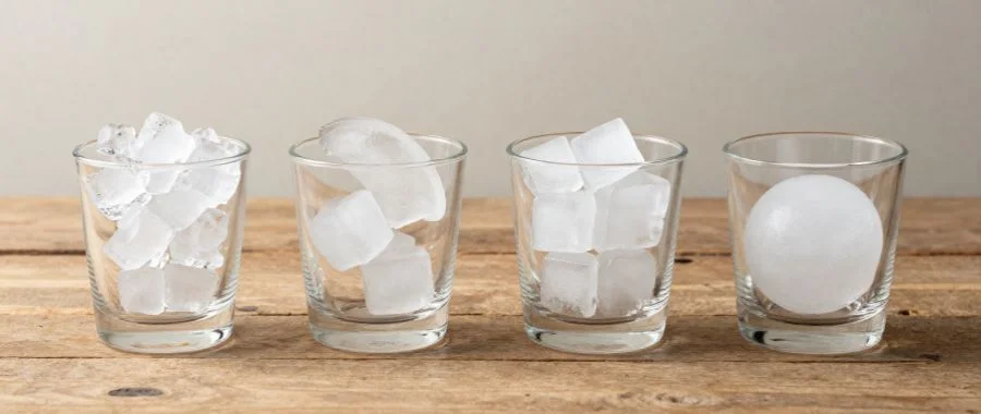 Cubed, crescent and sphere ice all shown in four different glasses.