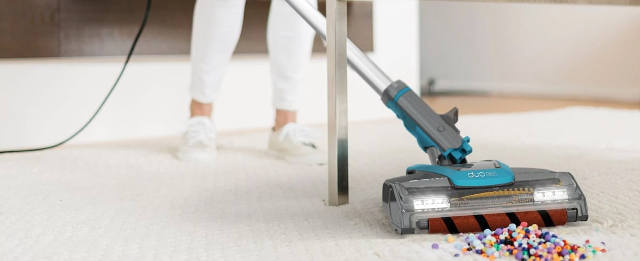 Shark vacuuming up multi colored beads