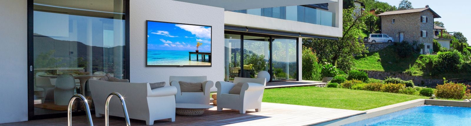 Outdoor Seating, TV and a swimming pool