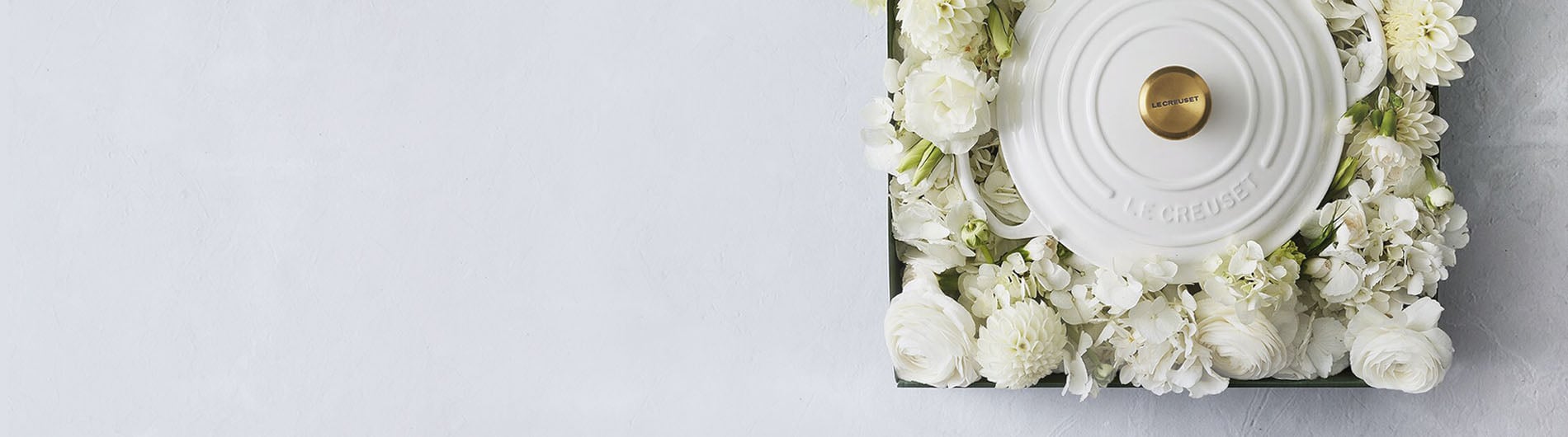 A cooking dish packaged in a box of flowers