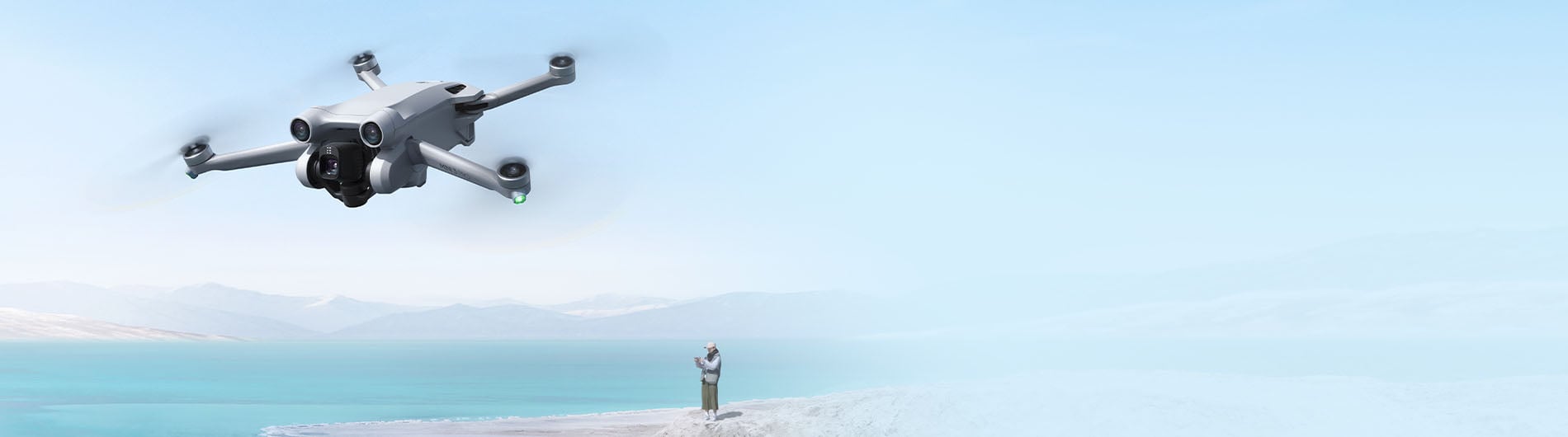 Man flying drone outdoors
