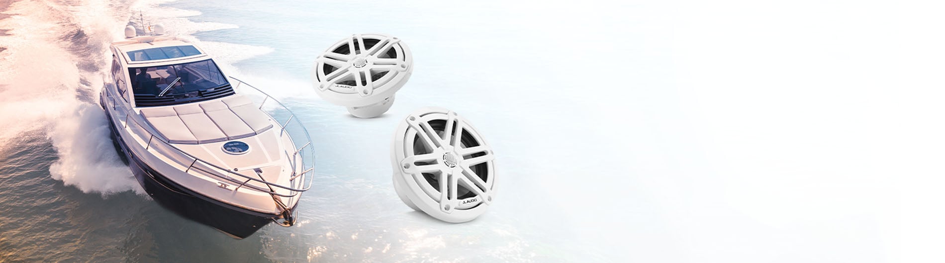 Boat sailing featuring marine audio speakers