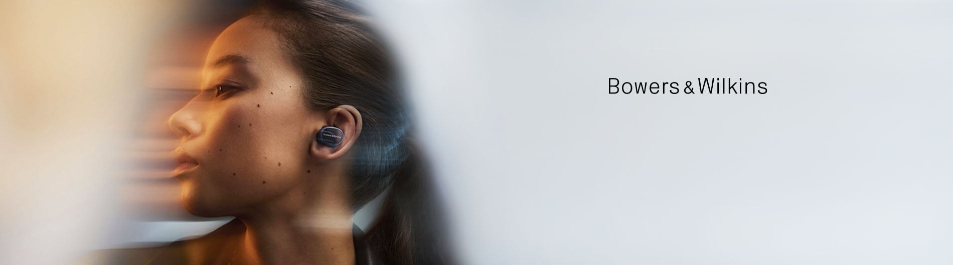 Woman wearing earbuds