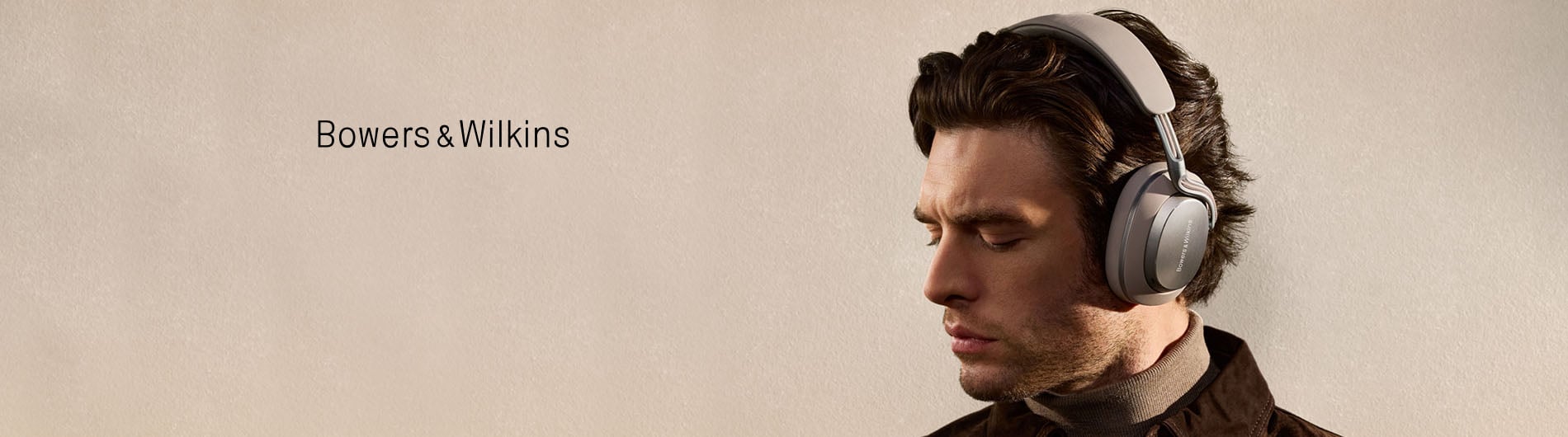 Man listening to audio with over-ear headphones
