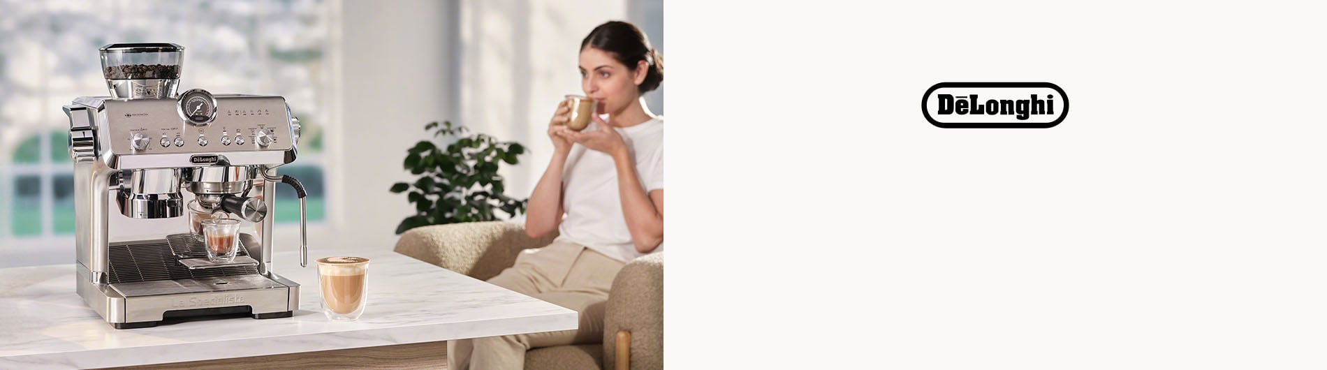 Woman sitting down on chair enjoying coffee
