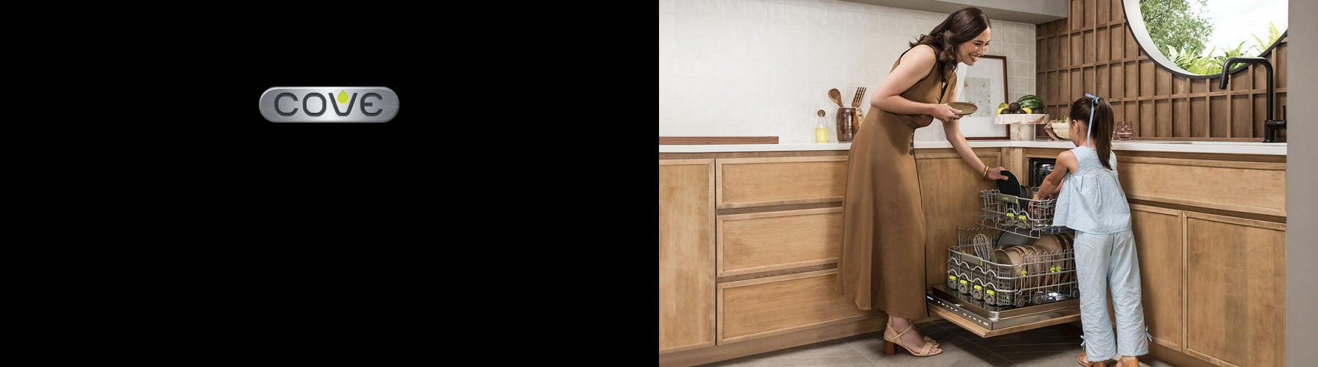 Mother and daughter in kitchen loading dishwasher
