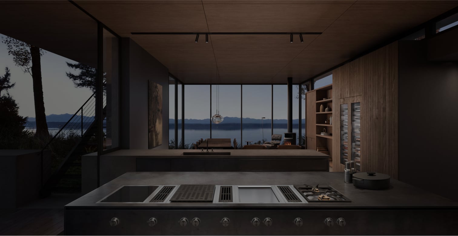 Stylish kitchen featuring Gaggenau appliances, with expansive windows revealing a beautiful lake view