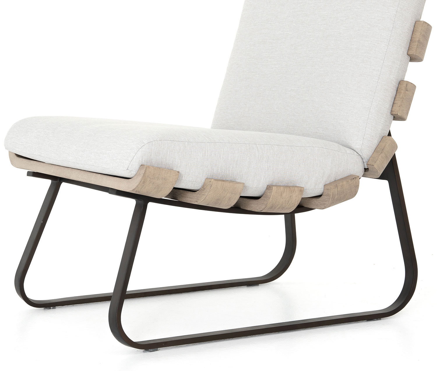 Close-up of the chair’s upholstered back and seat cushions showing beige-gray fabric and wooden slats.