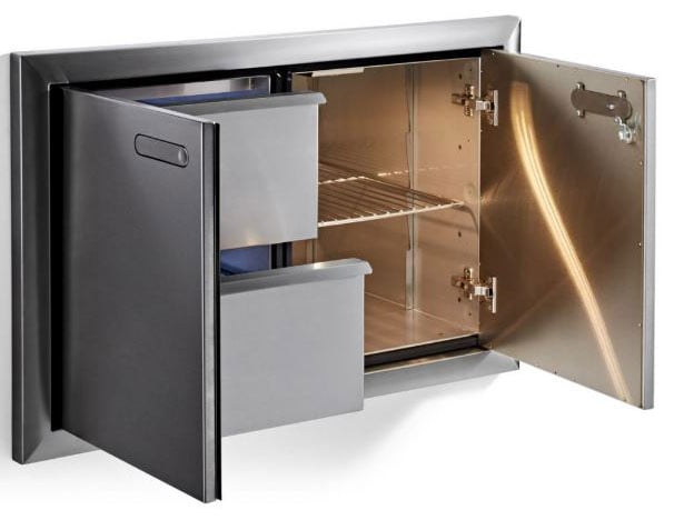 An open stainless steel mailbox with a shelf inside and two drawers on the left.
