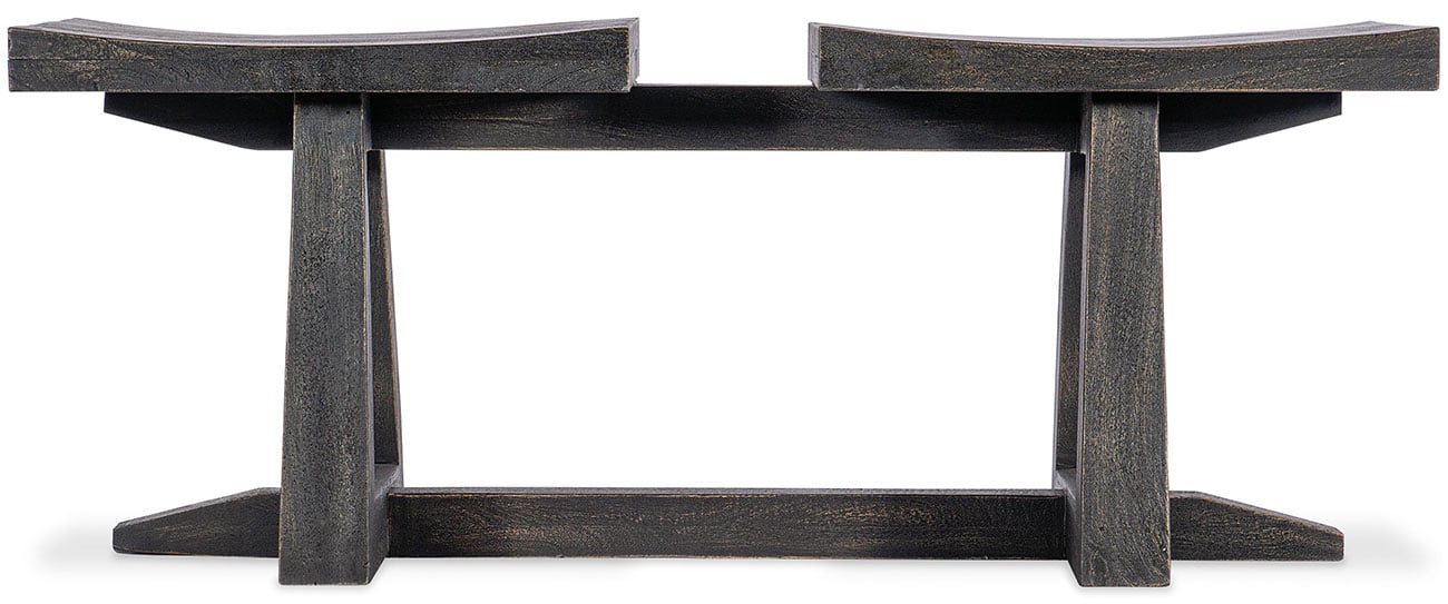 A black wooden bench with a distressed finish from the side