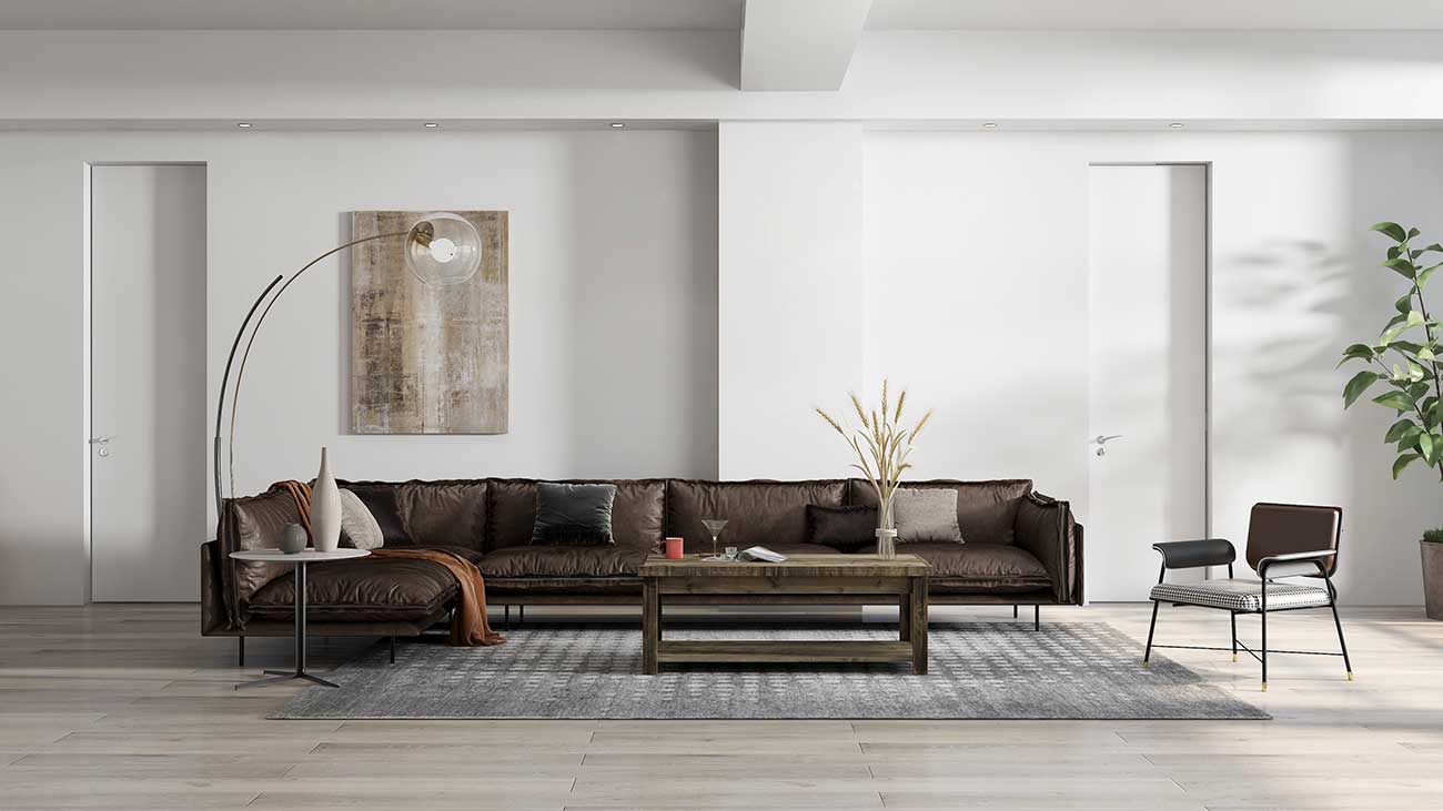 Brown wooden coffee table in modern living room with brown leather sofa