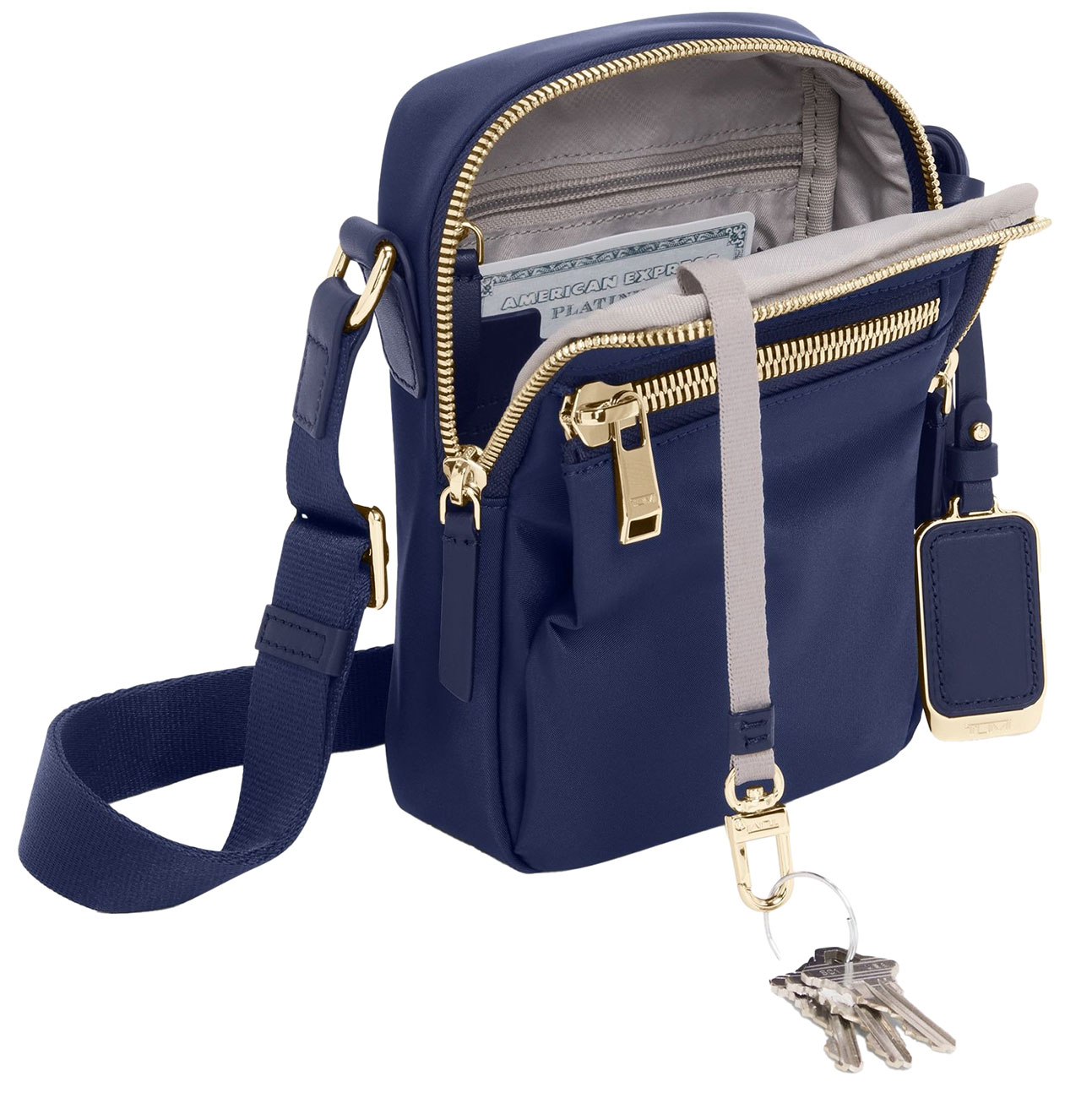 TUMI Voyageur Persia Crossbody in Indigo and Light Gold TUMI Voyageur Persia Crossbody in Indigo and Light Gold
