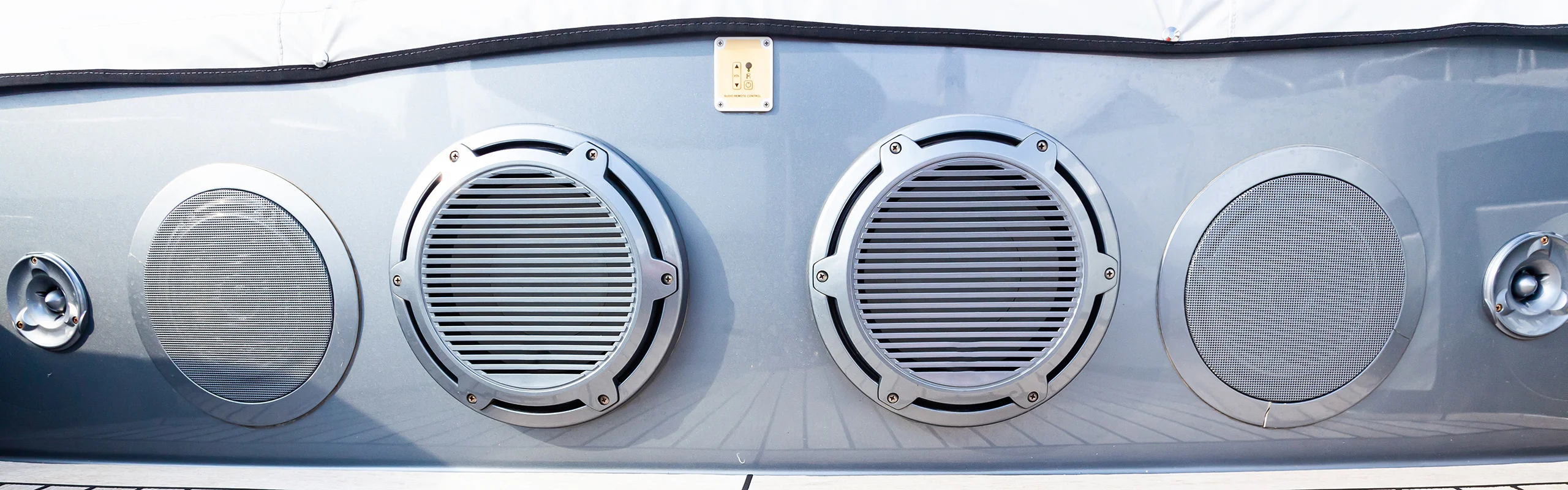 White speakers installed in boat