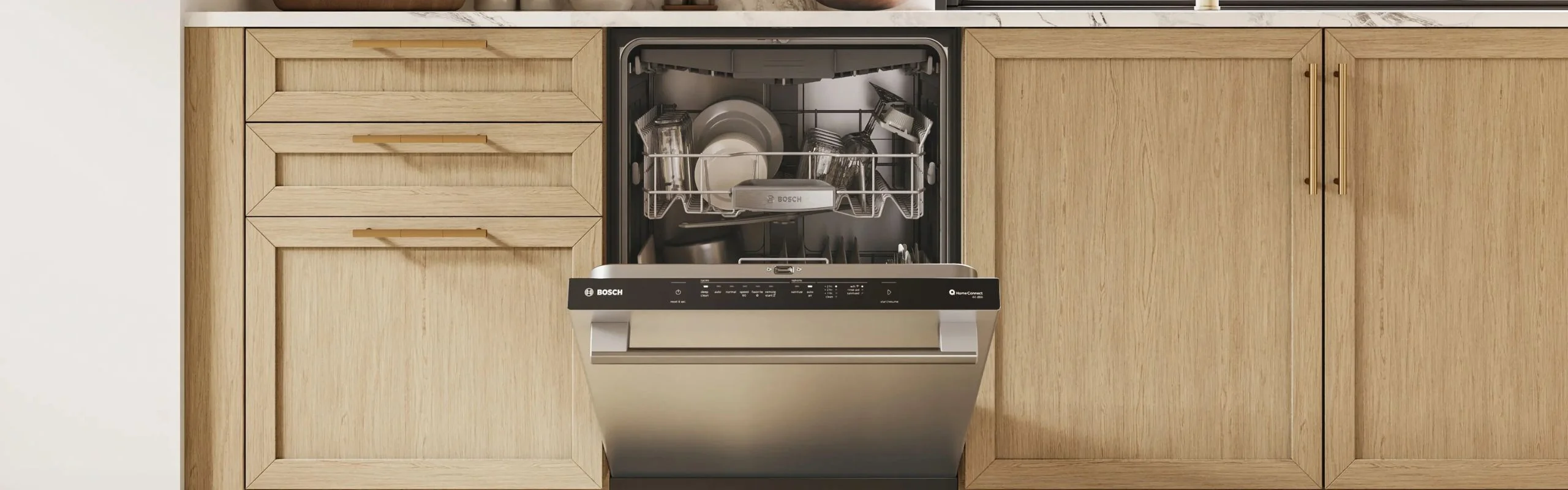 A Bosch 500 Series dishwasher slightly ajar and fully loaded in a modern home kitchen.