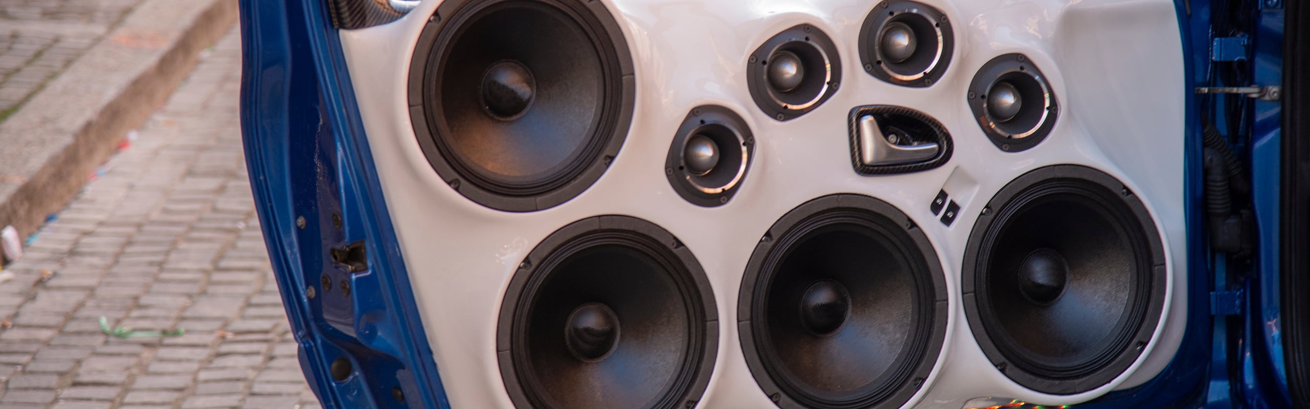 Car speakers installed in door