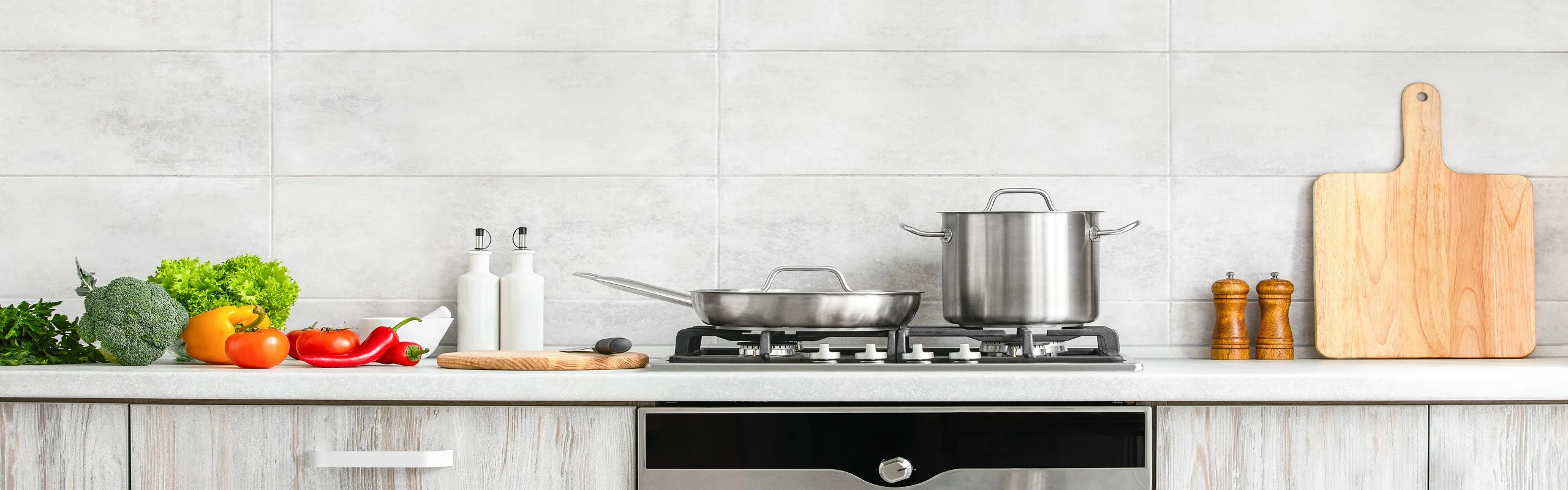 Stainless steel pot and pan on stove