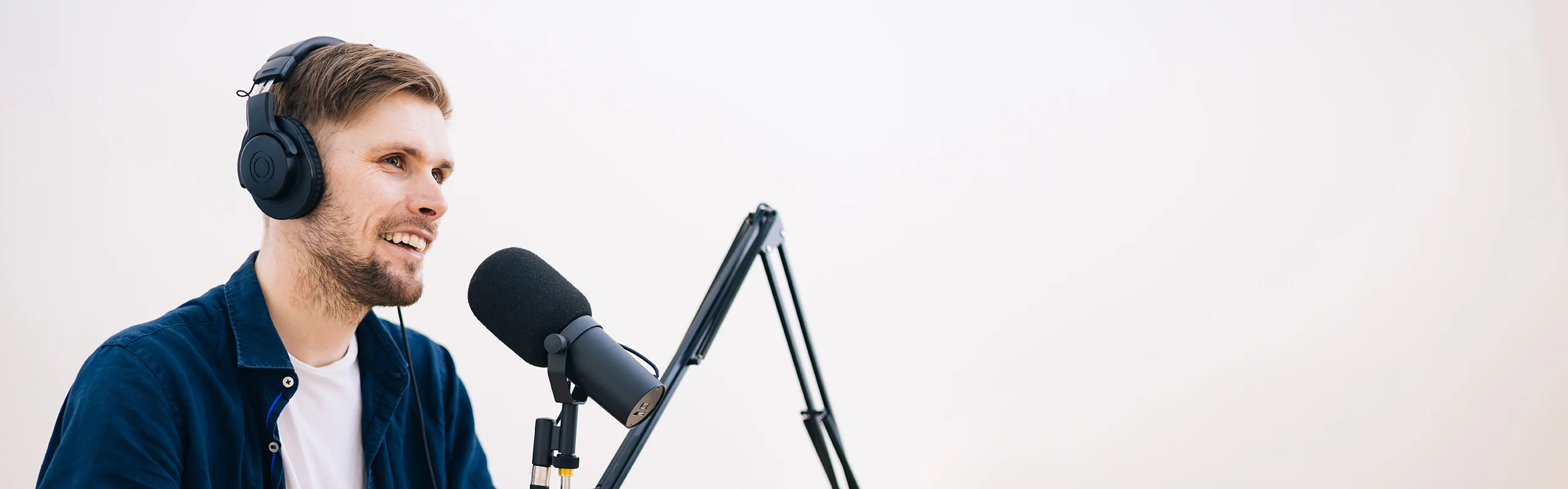 Man behind a microphone