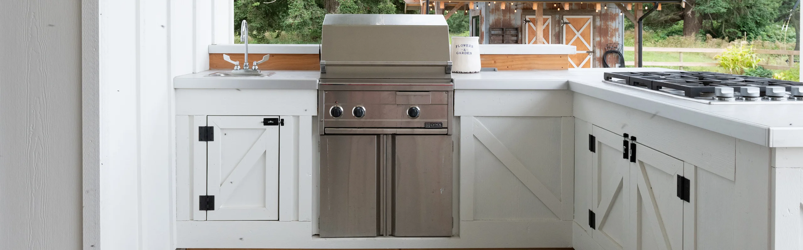 Outdoor grill with cabinets