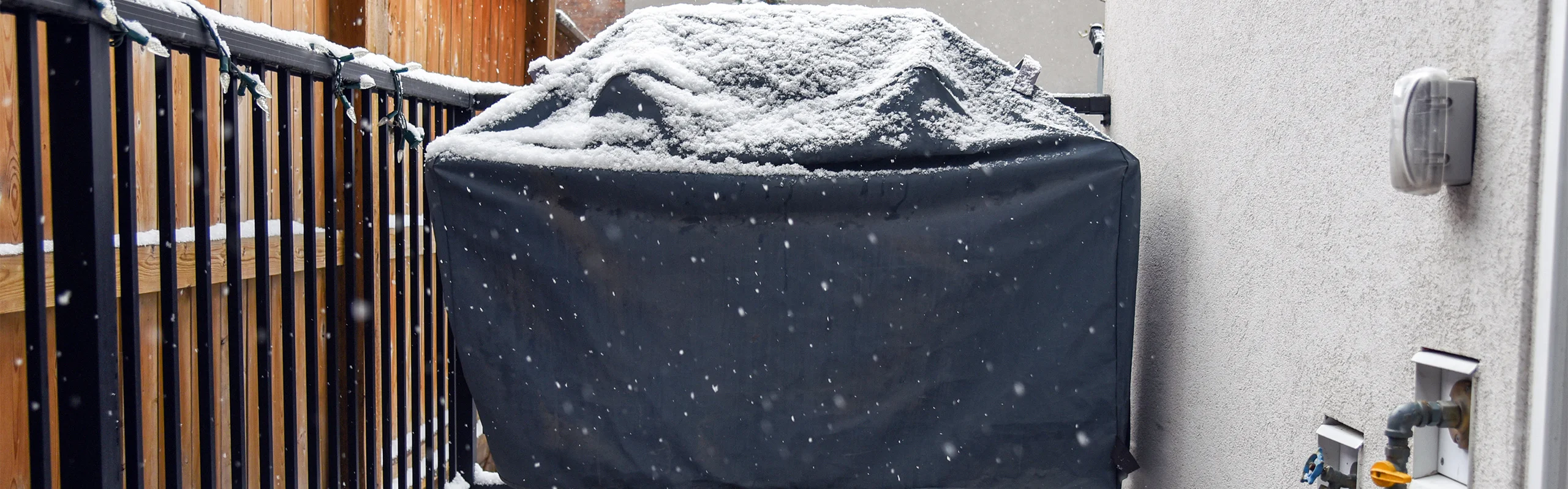Grill covered with snow