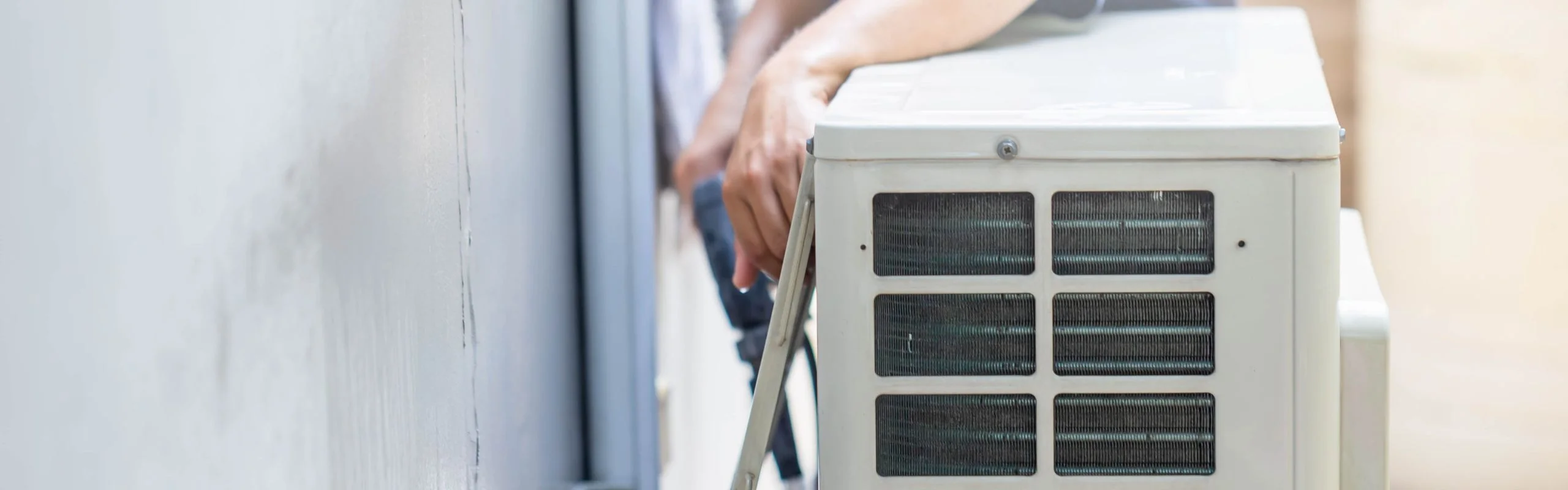 A person with their elbow on a furnace