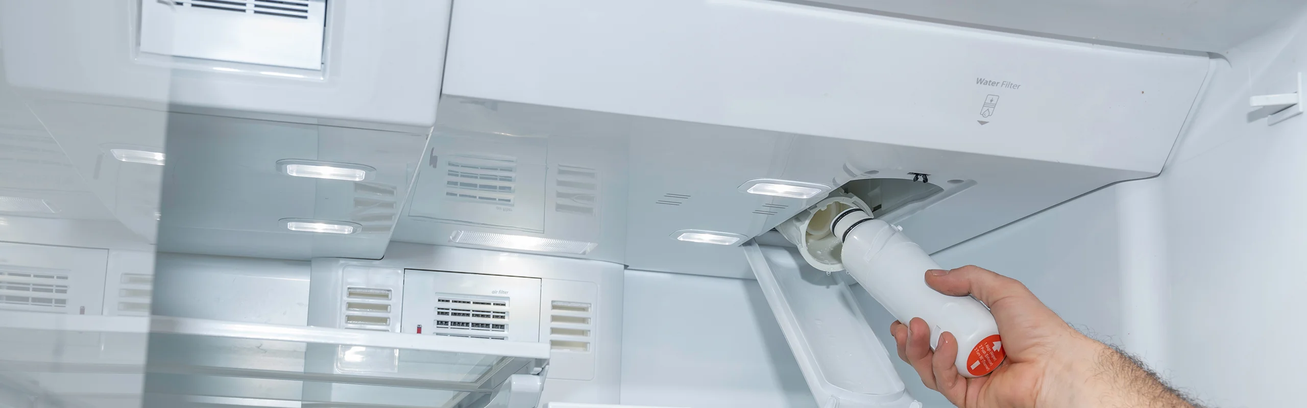 Installing water filter in fridge